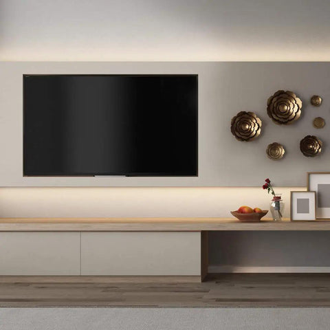 Modern living room setup with wall-mounted TV and accent lighting using 0 To 60 Watt Max Dimming LED Driver With Enclosure For Low Voltage Lighting 12V DC Power Supply No Minimum Load Fully Dimmable ELV Compatible With Lutron And Leviton Dimmers Black Enclosure