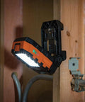 Rechargeable LED Work Light With 1000 Lumens, Magnetic Mount, 360 Degree Rotation, Kickstand, mounted on wooden beam