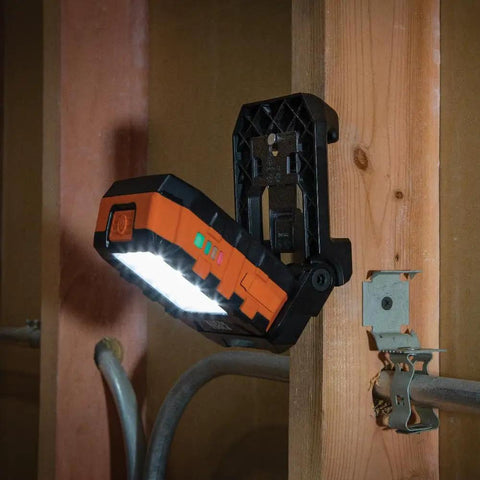 Rechargeable LED Work Light With 1000 Lumens, Magnetic Mount, 360 Degree Rotation, Kickstand, mounted on wooden beam