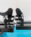 Close-up of the Centripetal Force Demonstrator Hands On Teaching Aid For Circular Motion Lab Gear components on a blue base.