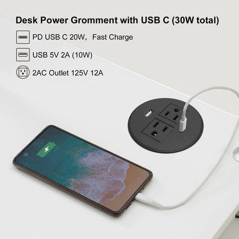 Keep Your Desk Legit Tidy With This 3.15 Inch Flush Mount Power Grommet Featuring Usb C Pd 20W And Usb A 10W Ports For Hella Quick Thirty Watt Fast Charging Any Day on a desk with a smartphone.