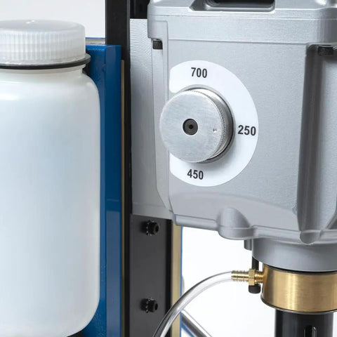 No Sweat Magnetic Drill Press Packing Three Speed Settings And Swivel Base 115V Motor close-up of speed settings dial and fluid container.