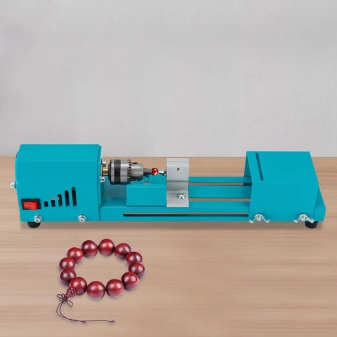 Compact Wood Lathe Machine Featuring 96 Watt Copper Motor Adjustable 4000 To 9000 Rpm Speed Aluminum Build and Dead Simple Controls for Reliable Polishing Grinding and Bead Turning Jobs with red bead necklace.