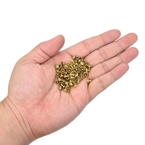 Genuine Brass Mushroom Leather Rivets Featuring Hella Durability Straight Up Smooth Gold Button Fasteners in a hand, 60 pieces.