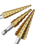Pro Grade High Speed Steel Titanium Step Drill Bit Set With Quick Change Quarter Inch Hex Shank Short Length For Hole Drilling 4 To 12 Mm And 4 To 20 Mm 3 Piece shown with three bits