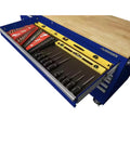 Badass 72 Inch Wide Mobile Workbench Tool Chest With Solid Wood Top Integrated Power Strip And 18 Hella Spacious Drawers For Rock Solid Gloss Blue Garage Storage showing organized tools in a drawer.