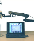 3.5X to 90X Zoom Stereo Microscope on an Articulating Arm with 144 LED Illumination and a 10MP Digital Camera, USB Two Point Zero Output, A Real Workhorse for Inspecting Circuit Boards and Dental Appliances, on bench with laptop