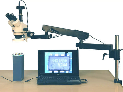 3.5X to 90X Zoom Stereo Microscope on an Articulating Arm with 144 LED Illumination and a 10MP Digital Camera, USB Two Point Zero Output, A Real Workhorse for Inspecting Circuit Boards and Dental Appliances, on bench with laptop