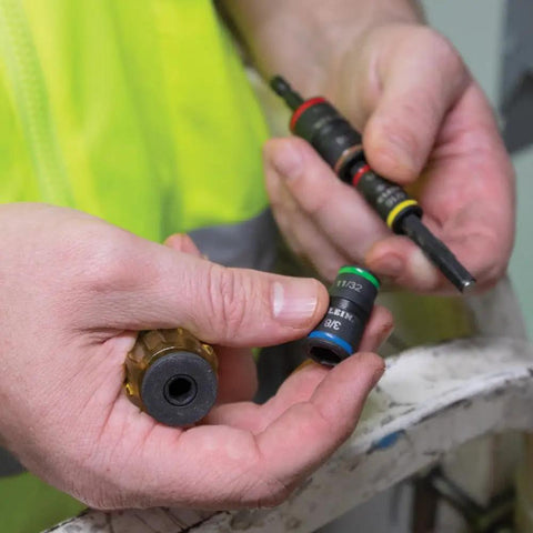 Hands holding the Impact Driver Socket Set With Flip Socket And Handle, 7 In 1, showing SAE hex sizes and bit holder.
