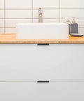 Bathroom cabinet with 6 Pack Finger Pulls For Cabinets With 76mm Hole Center And 102mm Overall Length Black Edge Pulls installed