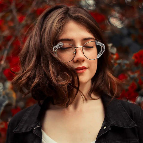 Woman wearing eyeglasses with Three Six Ten Pack Eye Glasses Side Shields Slip On TPU Guards, outdoors with red flowers background