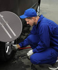 Dual Head Truck Tire Pressure Gauge With Plastic Scale Plate, Zinc Alloy Heads, Push Pull Chucks For Outer And Inner Wheels, 30 Degree Reverse Head For Tight Valves, Hanging Ring For Easy Storage, Precise Pressure Readouts in use on a car tire
