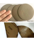 Dope 80 Pcs Of 5 Inch Hook And Loop Sanding Discs With Premium Silicon Carbide Abrasives For Wet Or Dry Polishing And Grinding Jobs On Metal Wood Paint displayed with fingers for size reference.