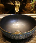 USZWBY Vessel Sinks Bathroom Vessel Sink Round Ceramic Washbasin Home Art Countertop Basin Utensil with Faucet Bathroom Bowl Sink, close-up view.