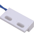 Surface Mount Magnetic Proximity Reed Switch Normally Open, white rectangular door sensor with blue wires, ideal for hidden installation