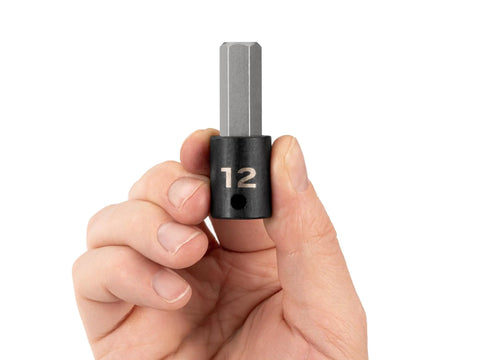 Hand holding a 12 mm Three Eighths Inch Drive Hex Impact Bit Socket with Precision Bit Geometry in two-piece design for higher torque