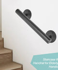 One Foot Matte Black Indoor Stair Railing and Short Metal Handrail Built Tough As Nails with Heavy Steel Pipe and Galvanized Brackets installed on wall.