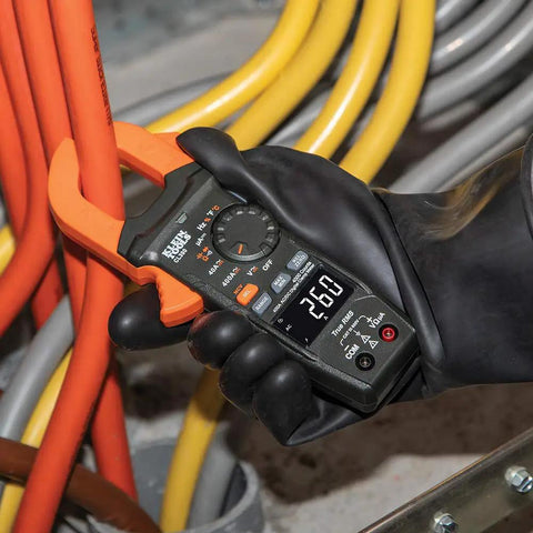 Electrician using Pro Grade AC DC Digital Clamp Meter With Auto Ranging 400 Amp Capacity Non Contact Voltage Tester Hi Vis LCD TRMS Readouts