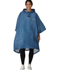 Person wearing Ultra Lite 2 Reusable Waterproof Breathable Poncho For Everyday Rain Gear Dope Lightweight Non Woven Polypropylene PFAS Free