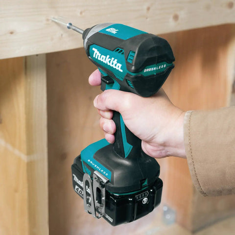 Powerhouse 18V LXT Brushless Cordless Impact Driver Kit With 4.0Ah Battery in use on wooden surface