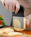 Large stainless steel wavy crinkle potato slicer with black handle from Amazon