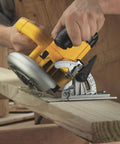 Lightweight 7-1/4 Inch Corded Circular Saw Featuring A Badass 15 Amp Motor With Snappy Electric Brake cutting through wooden plank.