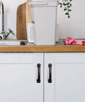 Arch Cabinet Pulls 3 Inch Matte Black Solid Zinc Die Cast installed on kitchen cabinets, showing modern design and durability.