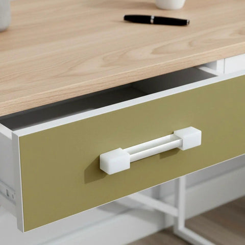 Detail of desk with open drawer and handle, showcasing a portion where corner protectors can be applied. Eight Pack Silicone F Shape Corner Protectors For Furniture And Wardrobes No Drill Install Kid Safe Soft Edge Guards For Baby Safety Collision Protection Sleek Bumpers To Level Up Your Home Decor.