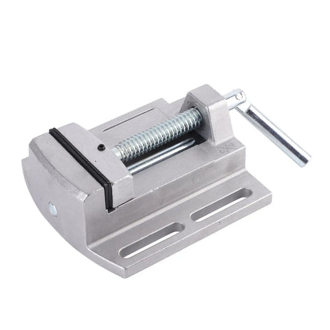 Solid 2.75 Inch Heavy Duty Drill Press Vise Crafted From Durable Aluminum Alloy With Hardened Steel Jaws For Woodworking And Metalworking Projects, Perfect For Benchtop Mount And Milling Machine Compatibility mounted on a flat surface.