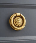 Brass Cabinet Ring Knobs Set, Gold Round European Style Drawer Pulls With Smooth Grip, Antique Gold Handles on dark surface
