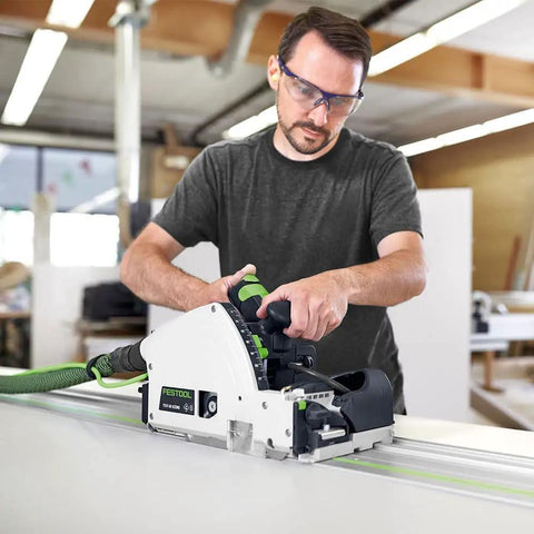 Badass Scorer Plunge Saw delivering smooth tear free cuts on veneer and laminated sheets, used by a professional carpenter.