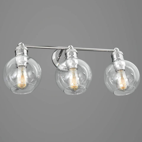 Three Light Coastal Vanity Light With Clear Glass Shades In Polished Nickel Finish Mounted on Wall