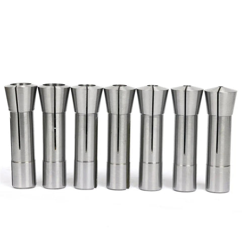 Seven metal pieces from R8 Collets Set 13 Piece Precision Mill Chuck Holder For Bridgeport Machines Shop Ready Size Range 1/8 To 7/8 Inches With.0006 TIR Runout And Drawbar Thread 7 16 20 Hardened And Ground in a row.