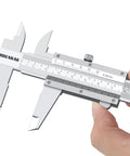 Hand holding Vernier Caliper, part of Pro Grade Measuring Kit With Vernier Caliper 0 To 6 Inches 0.001 Inch Precision External Micrometer.