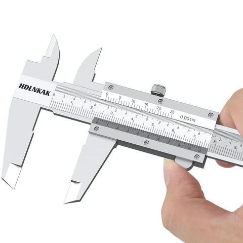 Hand holding Vernier Caliper, part of Pro Grade Measuring Kit With Vernier Caliper 0 To 6 Inches 0.001 Inch Precision External Micrometer.