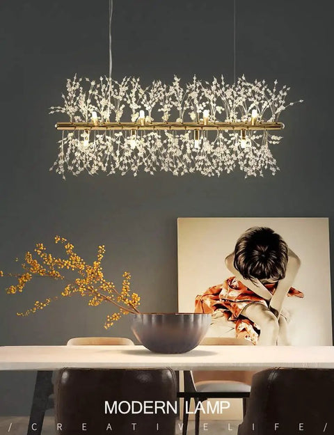 Modern Crystal Gold Ceiling Light Fixture With 12 Lights Linear Firework Design Hanging Chandelier shown over dining table
