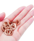 Hand holding 100 Pack M10 Copper Flat Washers Set ID 10mm OD 16mm Sealing Gasket Kit Heavy Duty Copper Washers