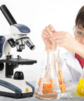 Starter Compound Monocular Microscope With 40X To 1000X Magnification Dual Illumination Fine Focus And 25X Wide Field Eyepiece Cordless Operation Kid Friendly Classroom Ready For Students Beginners Home Lab Science Projects with child conducting experiment