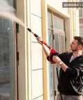 Man using Turbo Rotating Pressure Washer Nozzle With 4000 PSI Max And Quarter Inch Quick Connect For Cleaning Brick Concrete And Vinyl Surfaces