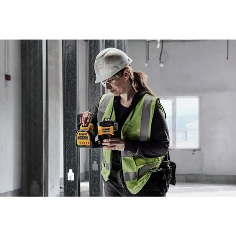 3 X 360 Degree Laser Level Kit With Fine Adjustment, 20V/12V MAX Power, Green Beam, Class II, 10 Hour Run Time On 20V Max Battery, Bright Yellow Case For Precise Plumb And Level Lines In DIY And Pro Projects. Worker using 3 X 360 Degree Laser Level Kit With Fine Adjustment, 20V/12V MAX Power, Green Beam, Class II, 10 Hour Run Time On 20V Max Battery, Bright Yellow Case For Precise Plumb And Level Lines In DIY And Pro Projects on wall framing