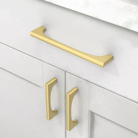 Top Notch Brushed Gold Cabinet Pulls 10 Pack 5 Inch Drawer Handles For Kitchen Cabinets on white drawers.