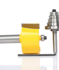 Top Shelf Rabbet Router Bit Set With Six Interchangeable Guide Rollers And Half Inch Shank, yellow and steel design for woodworking.