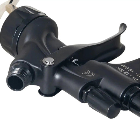 Close-up of Pro Setup 1.3Mm Pneumatic Spray Gun For Rolling Out Dope Automotive Topcoats And Heavy Duty Furniture Varnish With A Slick Water Based Green Primer Finish showing nozzle and trigger.