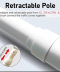 Close-up of a white 1.2 to 2.0m retractable pole for Ten Piece Blue Retractable Traffic Cone Connector Bars Rock Solid PVC Bar Links Zero Nonsense Setup For Parking Lots Construction Zones And Crowd Control Dividers.