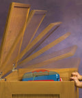Lid Stay Torsion Hinges For Cabinets, Soft Close, Rustic Bronze Finish, showing smooth opening lid on wooden toy chest.