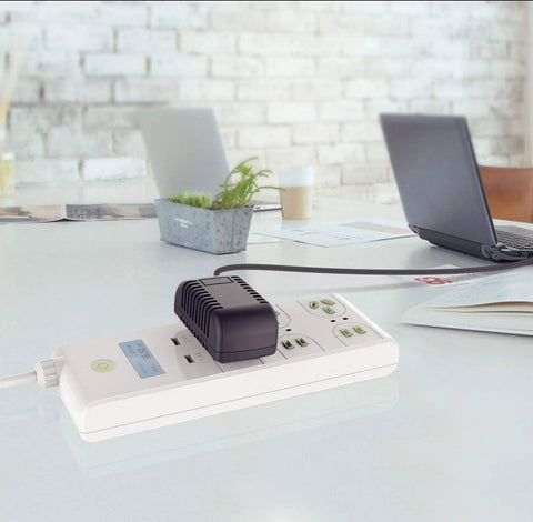 12V DC Power Supply Adapter For Hobby Tumbler NGPROTUMBLER3 on power strip with laptop on desk
