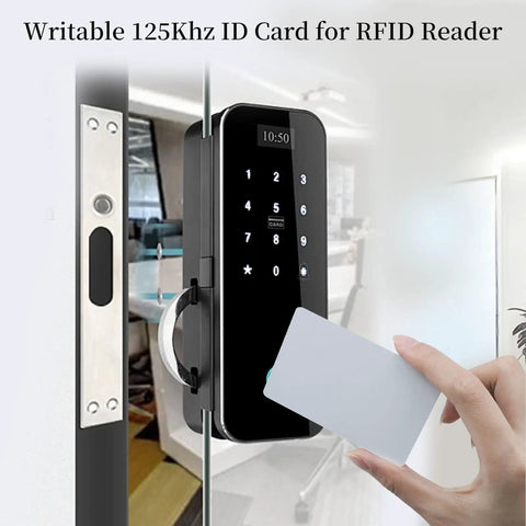 Hand holding 10 Pack Writable 125kHz T5577 RFID Cards Blank White Proximity Badges for Easy Access Control near door reader.