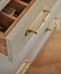 Champagne Bronze Cabinet Pulls 5.04 Inch Center To Center With Back Plate Zinc Alloy 2 Pack installed on kitchen drawer
