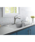 Linwood Pullout Kitchen Faucet With Soap Or Lotion Dispenser Polished Chrome Finish installed in modern kitchen sink