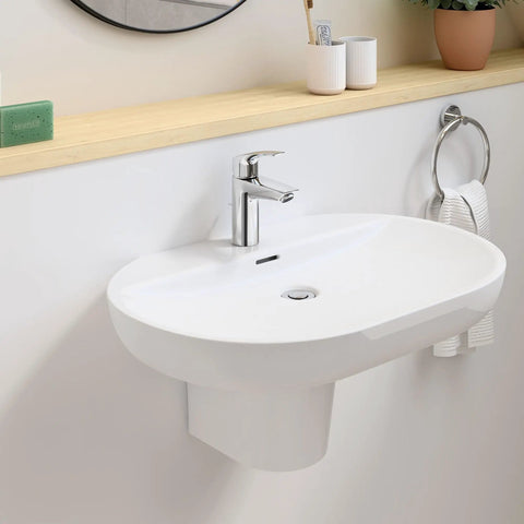 Eurosmart Single Hole Bathroom Faucet Single Handle Chrome Finish 1.2 GPM Flow Includes Nylon Braided Hoses on a white sink